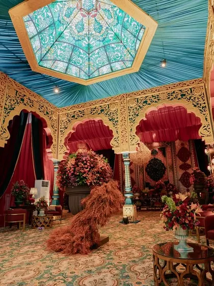 The final execution of the Durbar Hall inspired entry lobby. The hand-crafted hexagonal ceiling with stained glass motifs, turquoise pillars, and Mughal-Rajput arches created an unforgettable first impression for guests.