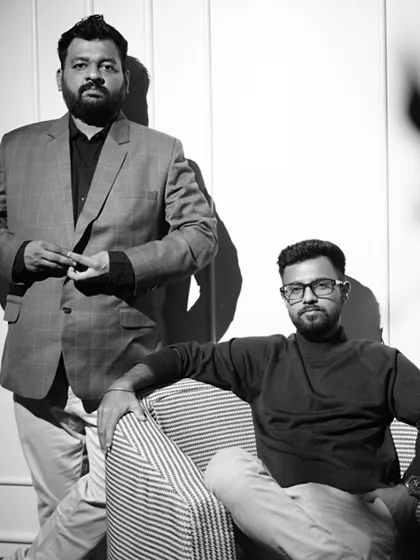 A black and white portrait of us, the founders of Nirmaan Architects. This was taken to celebrate our firm's 12th anniversary, reflecting on our journey and our commitment to timeless design.