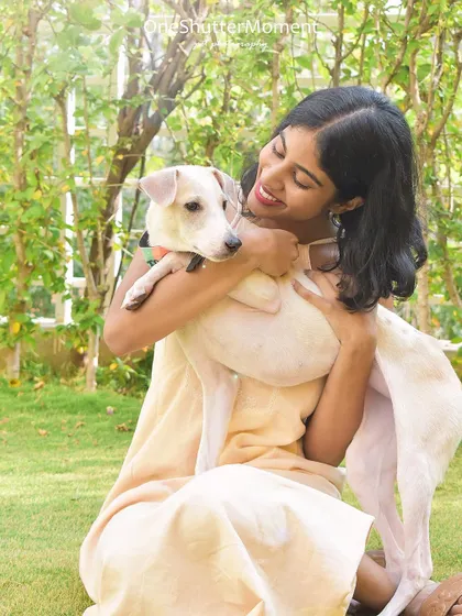 This is Kayal, a rescued indie with endless energy and love. Capturing her in a warm embrace with her mom shows the beautiful, trusting bond they've built.