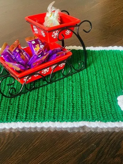 A top-down view of the green Santa hat placemat, perfect for showcasing your holiday treats.