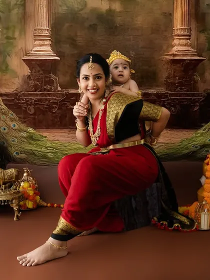 A fun pose with the baby Krishna riding on his mother's back, just like in the stories.