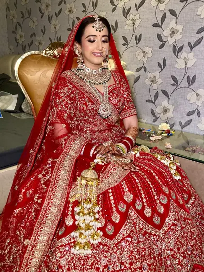 My lovely bride Vismita. I created a glamorous look with glittery eyes and a flawless base that made her shine on her special day.