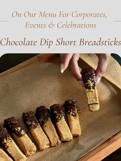 These chocolate-dipped shortbread breadsticks are a unique and delicious addition to any event menu.
