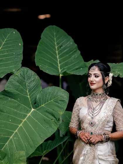 A beautiful bride looking radiant on her special day. My goal is to create mehendi that not only looks beautiful on its own but also enhances the bride's overall glow and confidence.