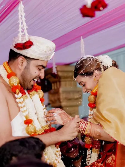 A playful, candid moment during the wedding ceremony. These natural interactions between the bride and groom are a core part of my storytelling approach.