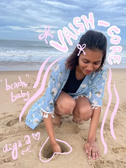 A "Vaish-core" moment, digging a heart in the sand. The text and bow doodles perfectly capture my aesthetic.