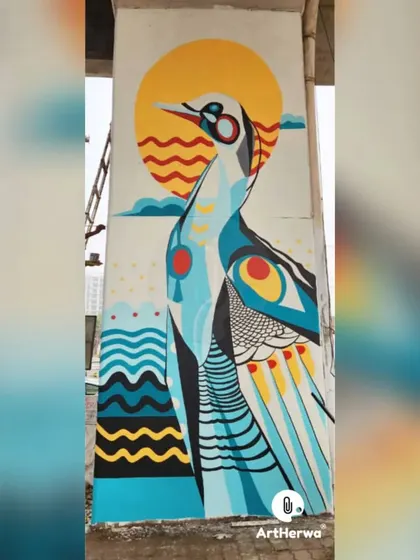 A stylized, graphic-style mural of a bird against a setting sun. This modern take on a nature theme uses bold patterns and colors.