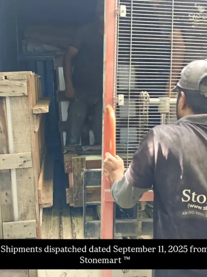 An artisan guides a large crate into the shipping container. My team oversees the entire dispatch process.