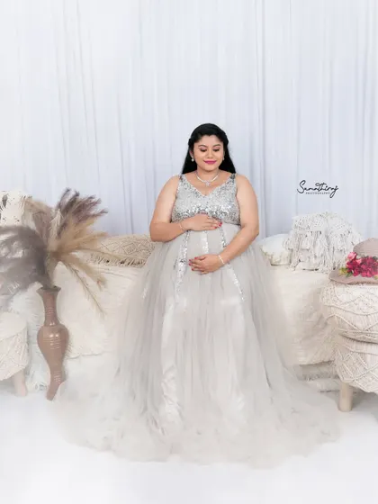 Another beautiful portrait from the boho-chic session, with the mother-to-be in a silver gown. The soft textures and neutral colors create a calm and relaxing atmosphere.