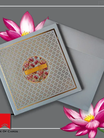 A beautiful pastel blue invitation with a delicate gold foil pattern and a floral motif. This card is the perfect blend of modern and traditional luxury.