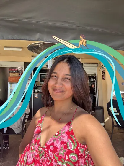 A selfie with some added flair. I drew some fun waves and a surfer doodle to match the beachy vibe of the day.