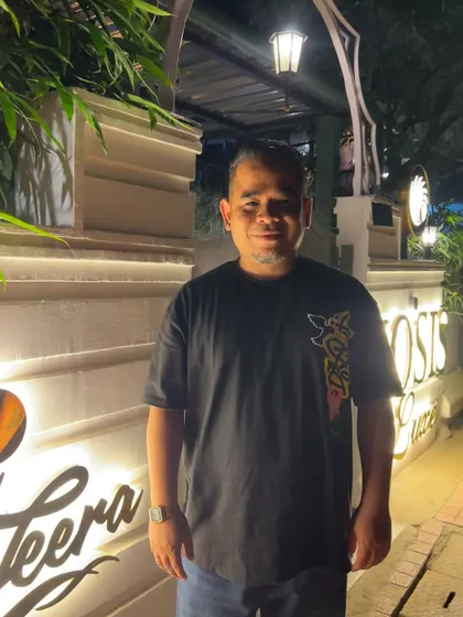 A simple portrait of me outside a venue. Just taking a moment to chill before the party starts.