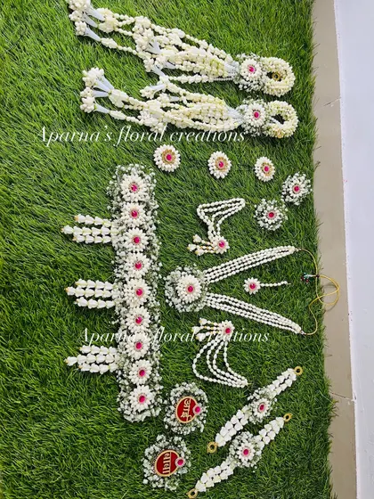 An overhead view of a complete baby shower jewellery set, showing all the matching pieces laid out. This gives a great idea of what a full set includes.