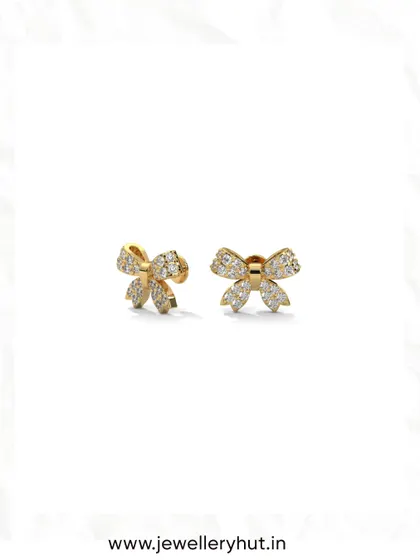 A close-up of our sparkling bow studs. These are perfect for adding a touch of feminine charm to any ear stack.