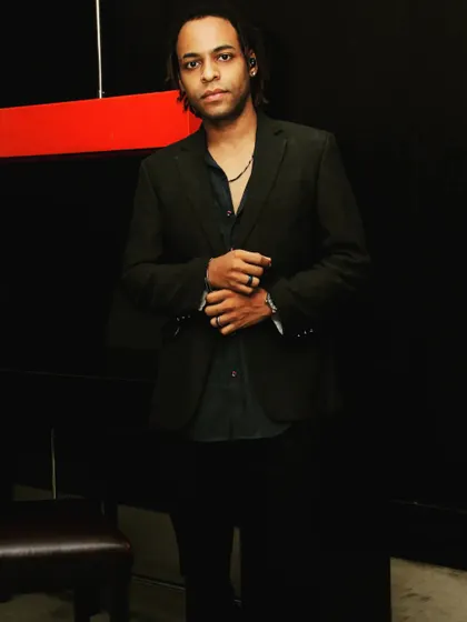 Dressed for a corporate or private event. I can tailor my look and music to fit the occasion, whether it's a formal gathering or a casual party.