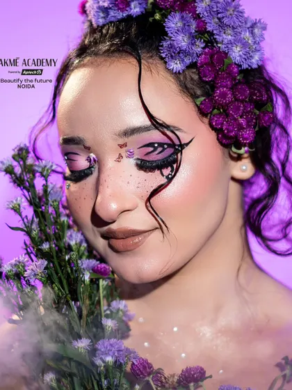 Unleash your creativity with fantasy makeup. This floral-themed look showcases the artistic skills our students develop, learning to use color, texture, and accessories to create living art.