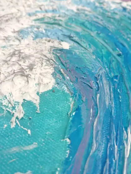 Another close-up of the wave texture, showing the layers of blue and white paint.