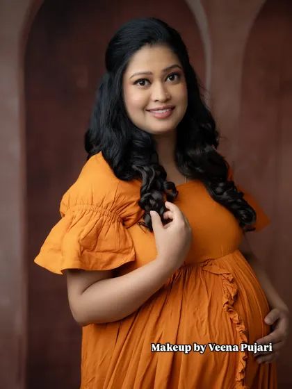 A beautiful smile from a happy mom-to-be. My goal is to make you feel confident and beautiful during your maternity shoot.