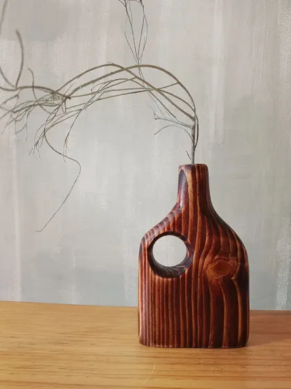 A duplicate of 156, the beautiful, deep-red stain on this wooden vase highlights the natural lines and knots in the pine wood, making each piece truly one-of-a-kind.