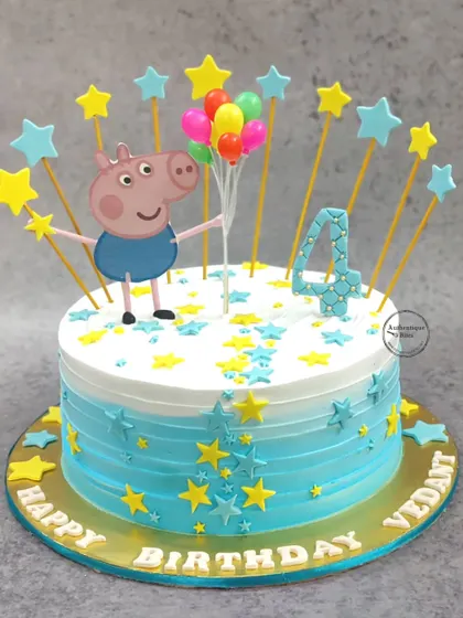 A starry George Pig cake for a 4th birthday. This design features Peppa's little brother George holding balloons amidst a sky full of stars.
