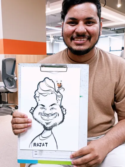 A happy employee from a Lotusflare corporate event. These on-the-spot portraits are a great way to add interactive entertainment to any office party or team-building day.