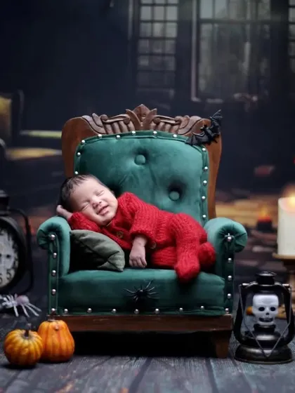 Another view of our fun Halloween setup. We use dramatic lighting and classic spooky props to create a memorable "my first Halloween" portrait.