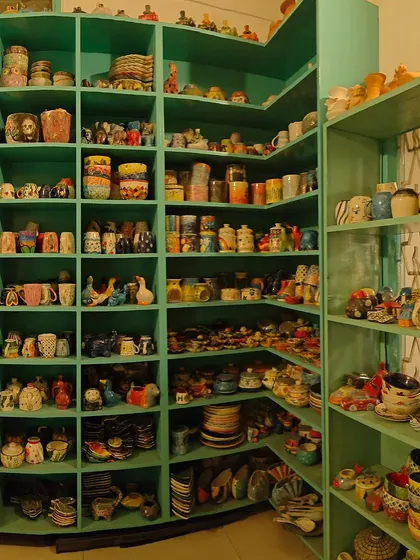 A wide view of our ceramic corner, filled with hundreds of finished pieces that provide inspiration for your own project.