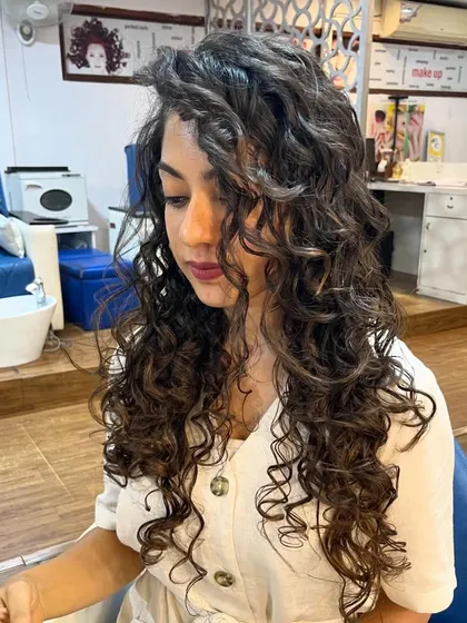 Varsha's beautiful long curls, perfectly defined and shaped.