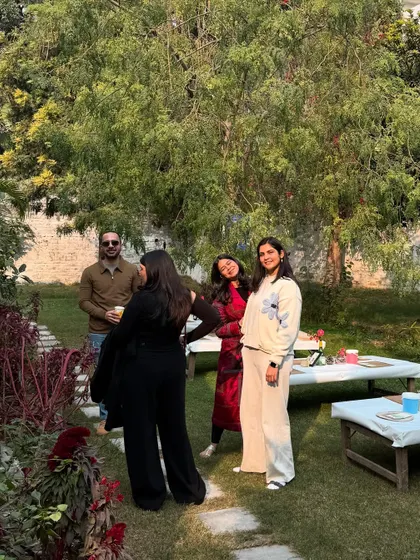 Candid moments of connection and laughter after a workshop. These events are as much about building community as they are about the yoga practice itself.