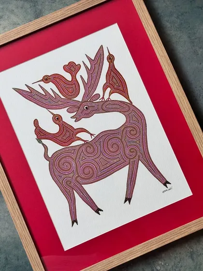 This Gond art piece, featuring a deer and birds, is a beautiful example of the intricate patterns and vibrant colours typical of this art form. It's a testament to the timeless, ethereal quality of handcrafted Indian art.