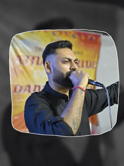 A close-up shot of me on the mic during the Ajnara Pride Dandiya night. The focus and intensity show how seriously I take the job of keeping the energy high.