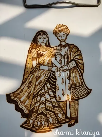 A beautiful henna concept drawing of a reception couple. I often sketch out my ideas to perfect the details before applying the mehendi, ensuring every portrait is just right.