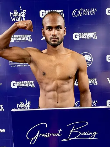 Weigh-ins done. A fighter looking ripped and ready for fight night.