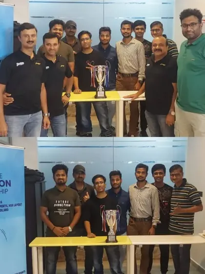 Two groups of team managers posing with the tournament trophy. This captures the anticipation and competitive spirit even before the event officially kicks off.