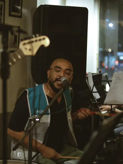 A drummer-vocalist multitasking with passion and skill. We love seeing the incredible range of talent that comes through our doors.