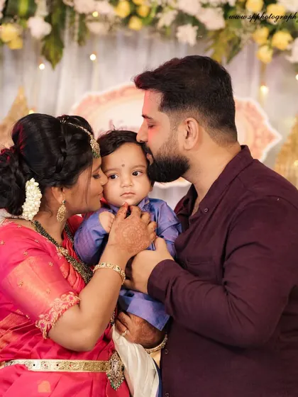 (Hero Media) We believe the most beautiful portraits capture the quiet, loving connections within a family. This tender moment between parents and their newborn is a perfect example of the timeless images we strive to create.