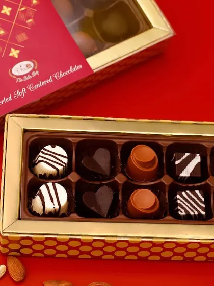 Our assorted soft-centered chocolates are available in elegant gift boxes of 12. This is a perfect premium gift for corporate clients, festivals, or any special occasion.