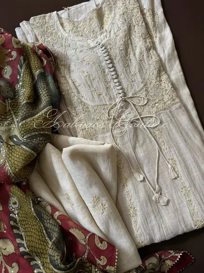 This image displays the full set, including the Anarkali, its coordinated plain dupatta, and the optional hand-painted Kalamkari dupatta for a more opulent look.