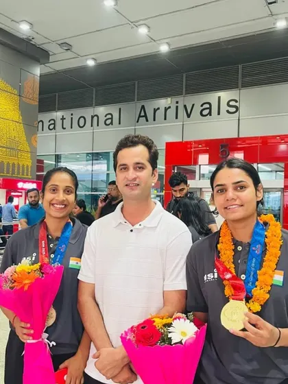 Another photo from the airport welcome, capturing the joy and pride of our athletes and coaches. These moments are the beautiful culmination of years of hard work.