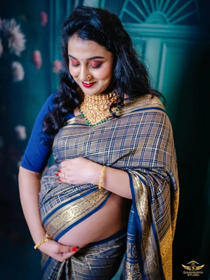 A duplicate of 137, this intimate portrait is full of warmth and emotion, a perfect capture of a mother's love.