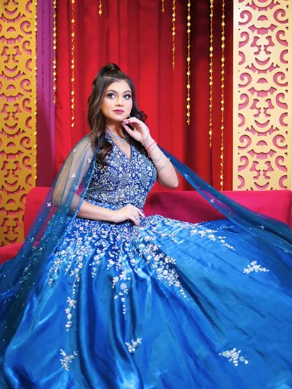 A close-up portrait in the blue ball gown, perfect for showing off your makeup and jewelry.
