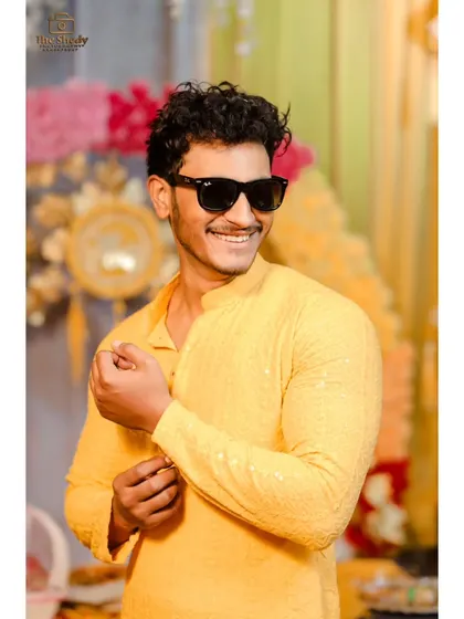 "Bride ka pyara Bhai" looking cool and happy at the Haldi ceremony. We make sure to get great shots of the whole family.
