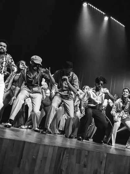 A timeless black and white shot capturing the soul of our 70s-inspired locking and soul performance. The energy and funk of the Soul Train era were brought to life on our stage.