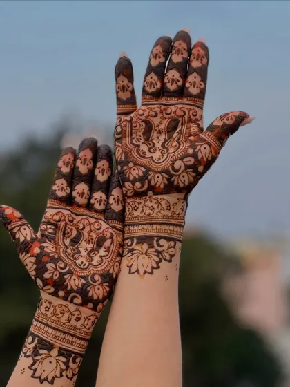 A beautiful design featuring traditional motifs like elephants in a more spaced-out, modern arrangement.