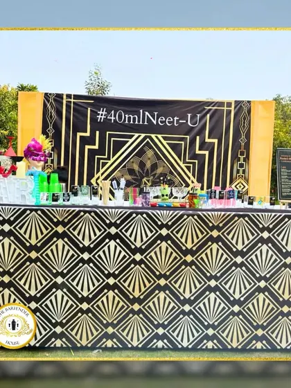 A Great Gatsby inspired bar design for a glamorous '40mlNeet-U' event. The bold black and gold art deco pattern creates a look of pure opulence and style.