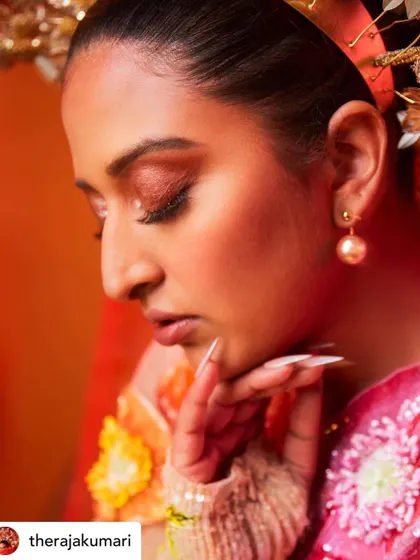 A beautiful profile shot showing how the long, elegant nails completed The Raja Kumari's overall look.
