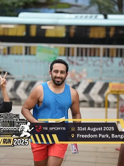 A quick smile and a peace sign for the camera during the Advokathon run. It's important to have fun even when you're pushing yourself.