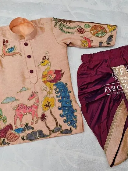 Another view of the hand-painted boys' kurta set. The intricate details and bright colors make this a truly unique piece of wearable art.