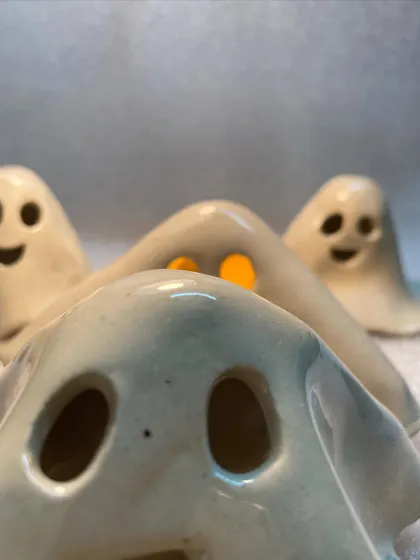 A close-up view of a ghost tea light holder. The simplicity of the shape is what makes them so charming.
