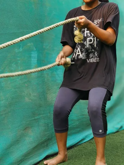 Rope pulls are an excellent way to build grip, back, and bicep strength, and she is tackling them head-on.